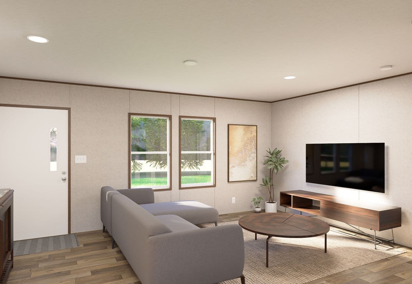 The CEDAR Living Room. This Manufactured Mobile Home features 3 bedrooms and 2 baths.