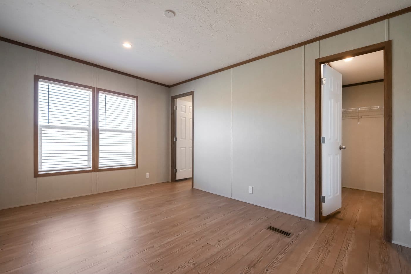 The SEAS THE DAY Bedroom. This Manufactured Mobile Home features 3 bedrooms and 2 baths.
