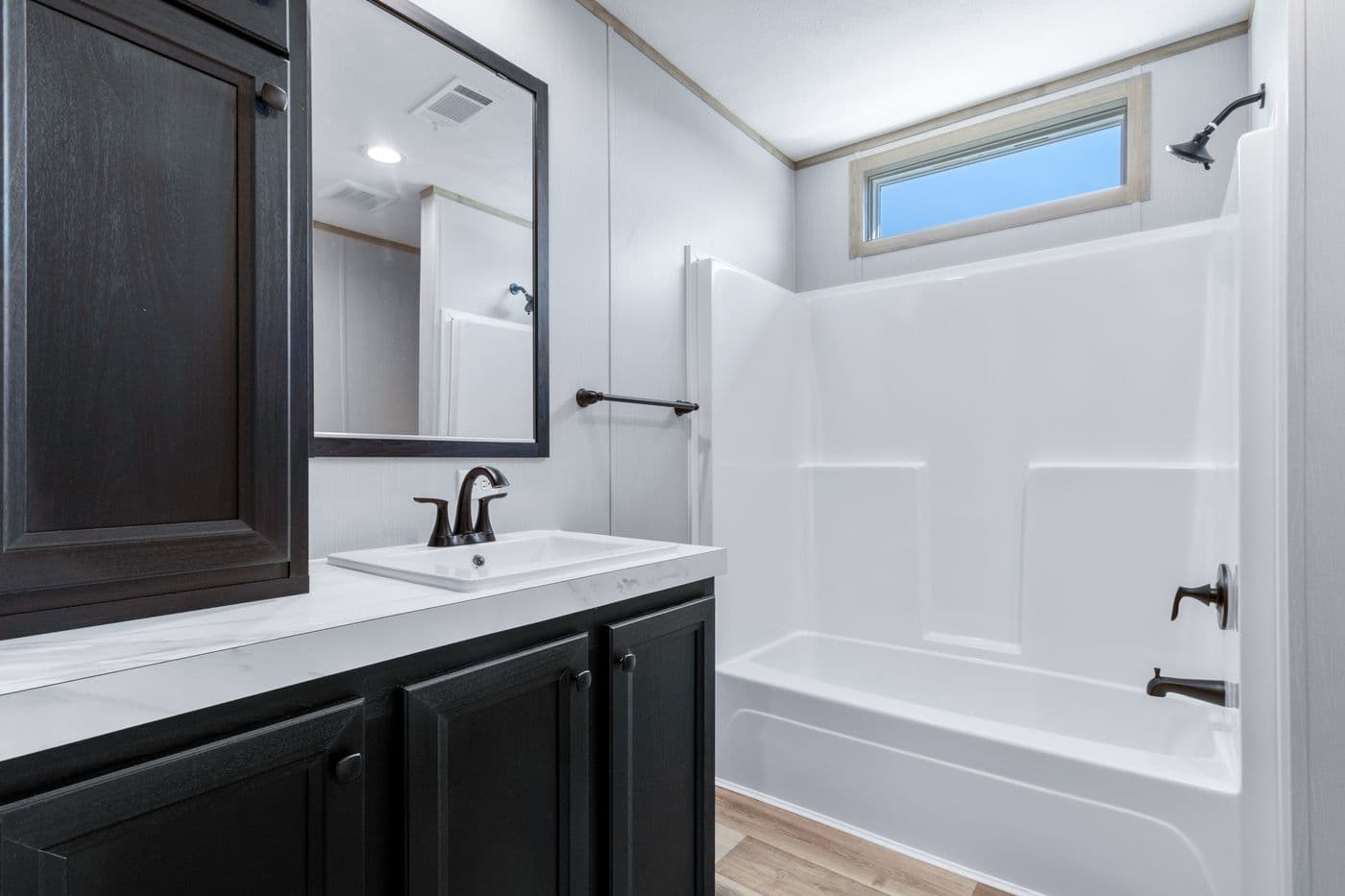 The ANATOLIA XL Guest Bathroom. This Manufactured Mobile Home features 3 bedrooms and 2 baths.