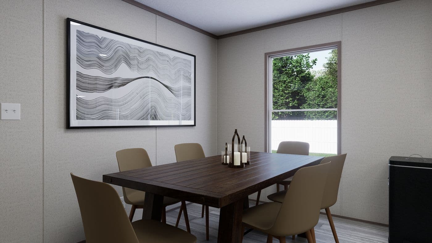 The THE MOUNTAINEER 60 Dining Area. This Manufactured Mobile Home features 3 bedrooms and 2 baths.