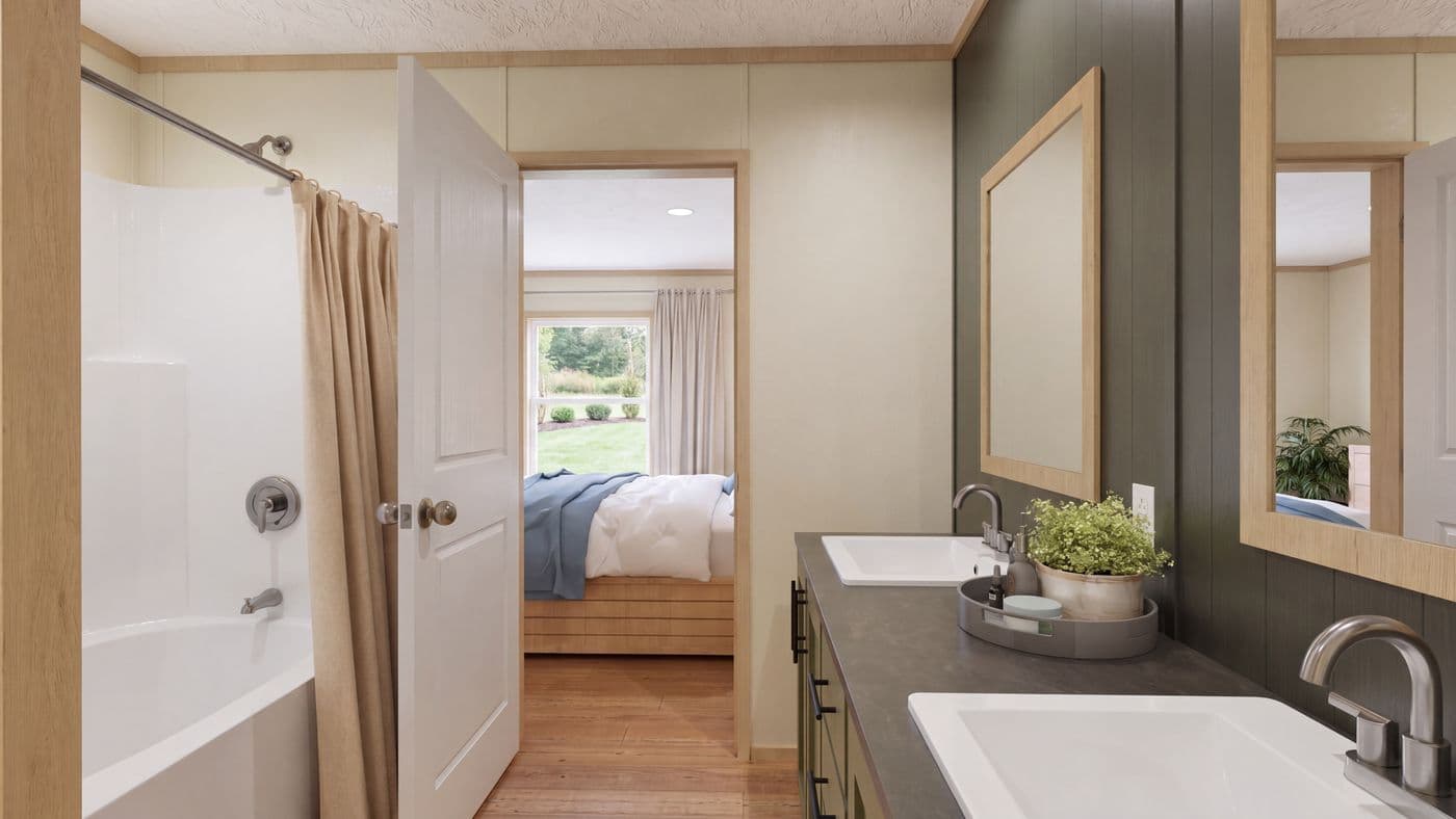 The BOONE Primary Bathroom. This Manufactured Mobile Home features 4 bedrooms and 2 baths.