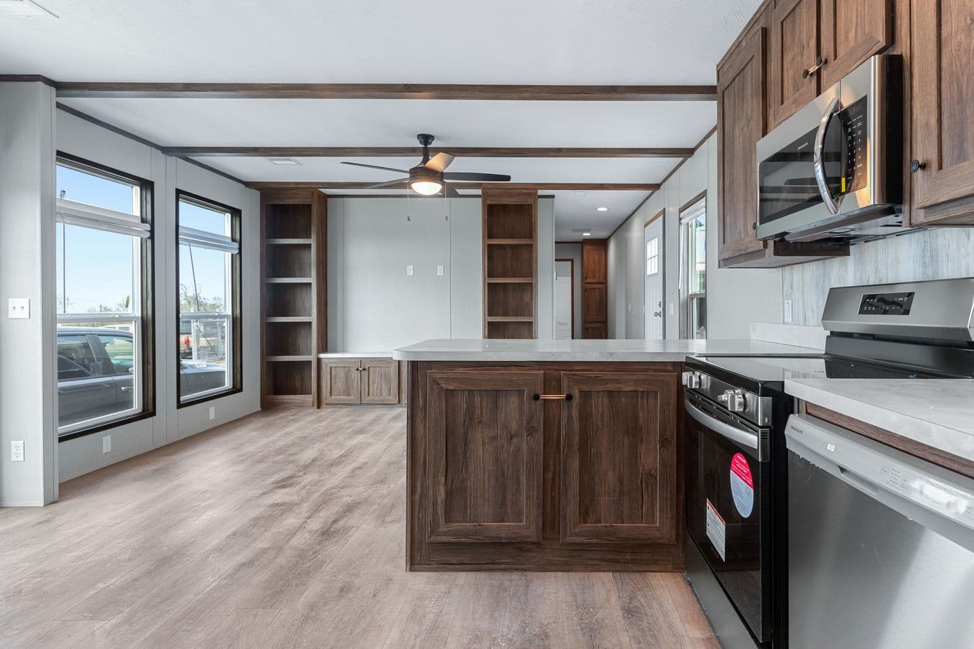 The ANNIVERSARY 16683B Kitchen. This Manufactured Mobile Home features 3 bedrooms and 2 baths.