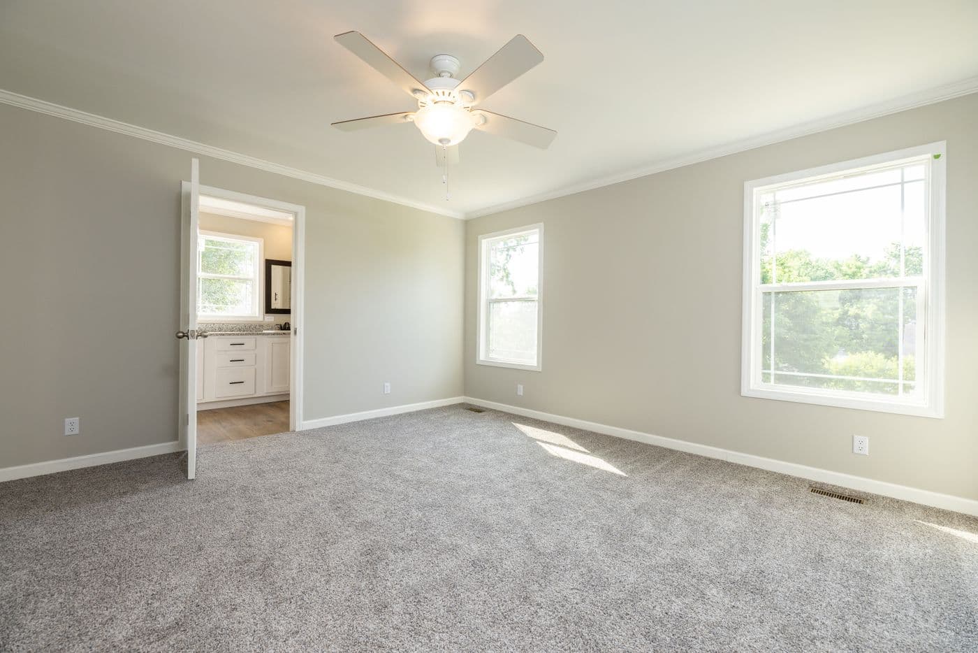 The HAWTHORNE Primary Bedroom. This Manufactured Mobile Home features 3 bedrooms and 2 baths.