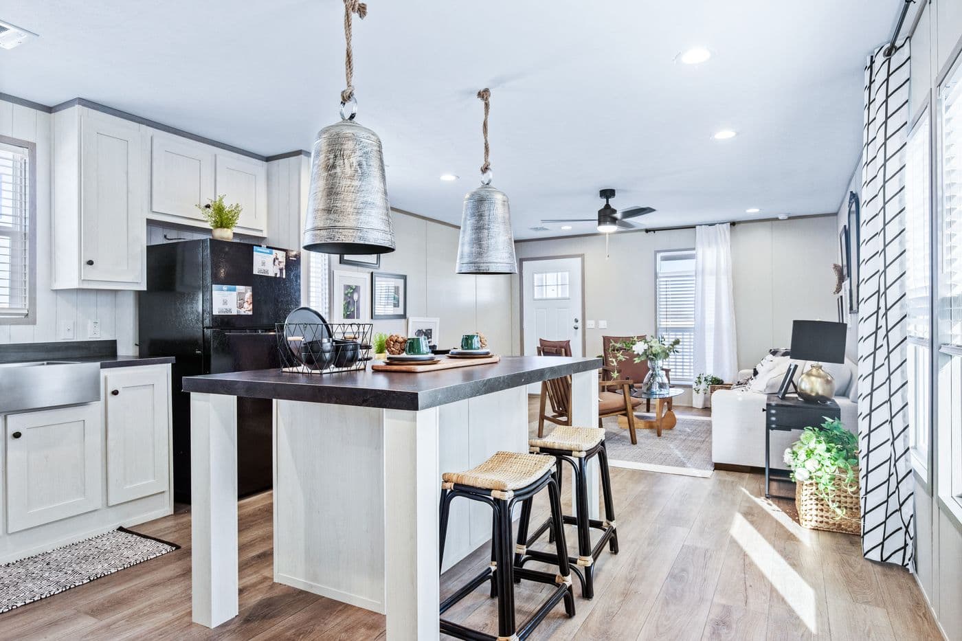 The PORCH LIVING SERIES 16682A Kitchen. This Manufactured Mobile Home features 2 bedrooms and 2 baths.