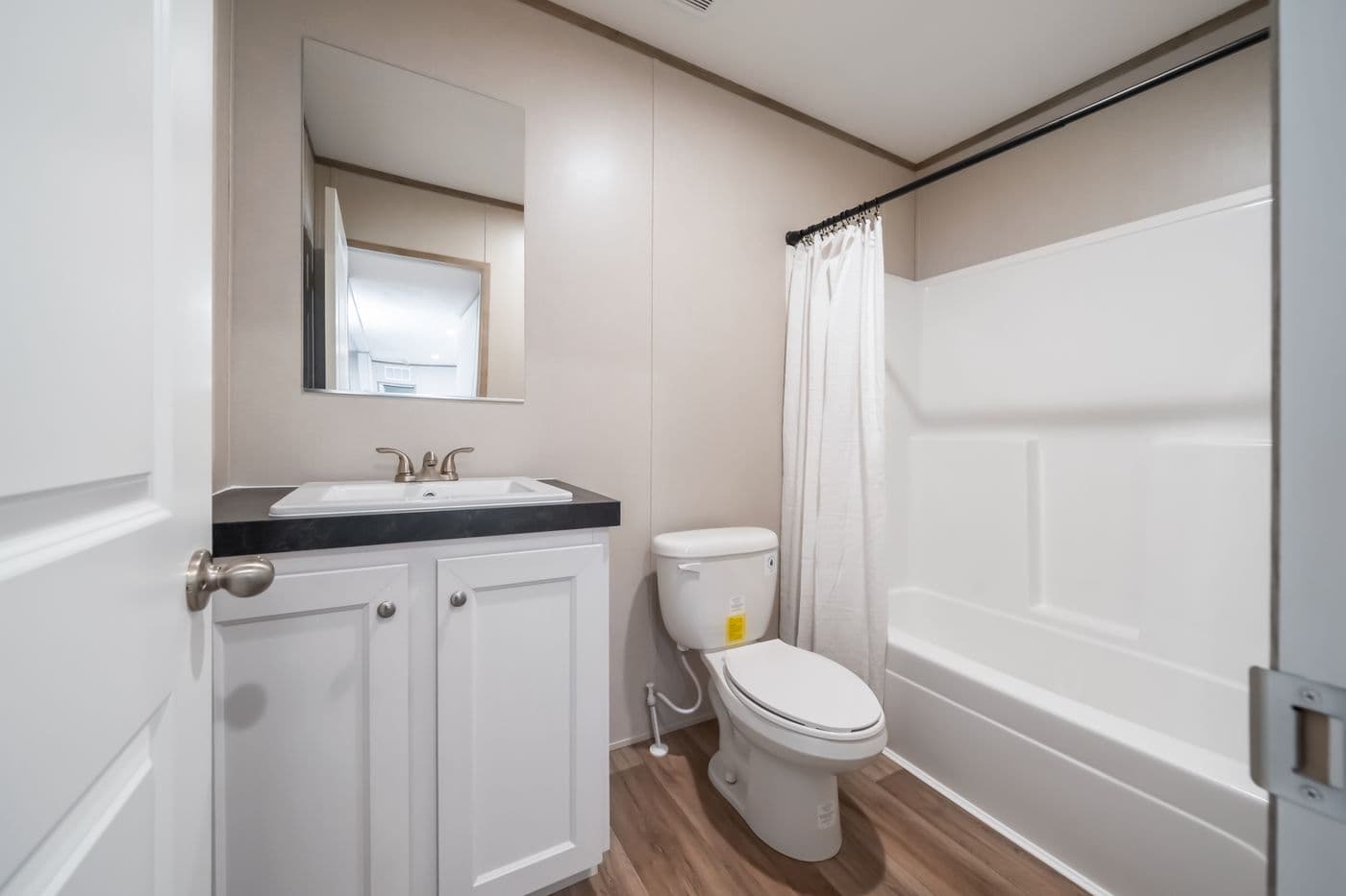 The VISTA Guest Bathroom. This Manufactured Mobile Home features 3 bedrooms and 2 baths.