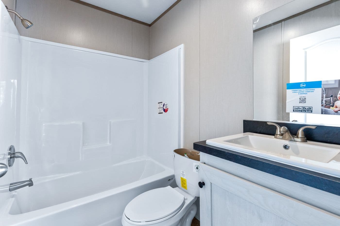 The RESOLUTION 16763K Guest Bathroom. This Manufactured Mobile Home features 3 bedrooms and 2 baths.