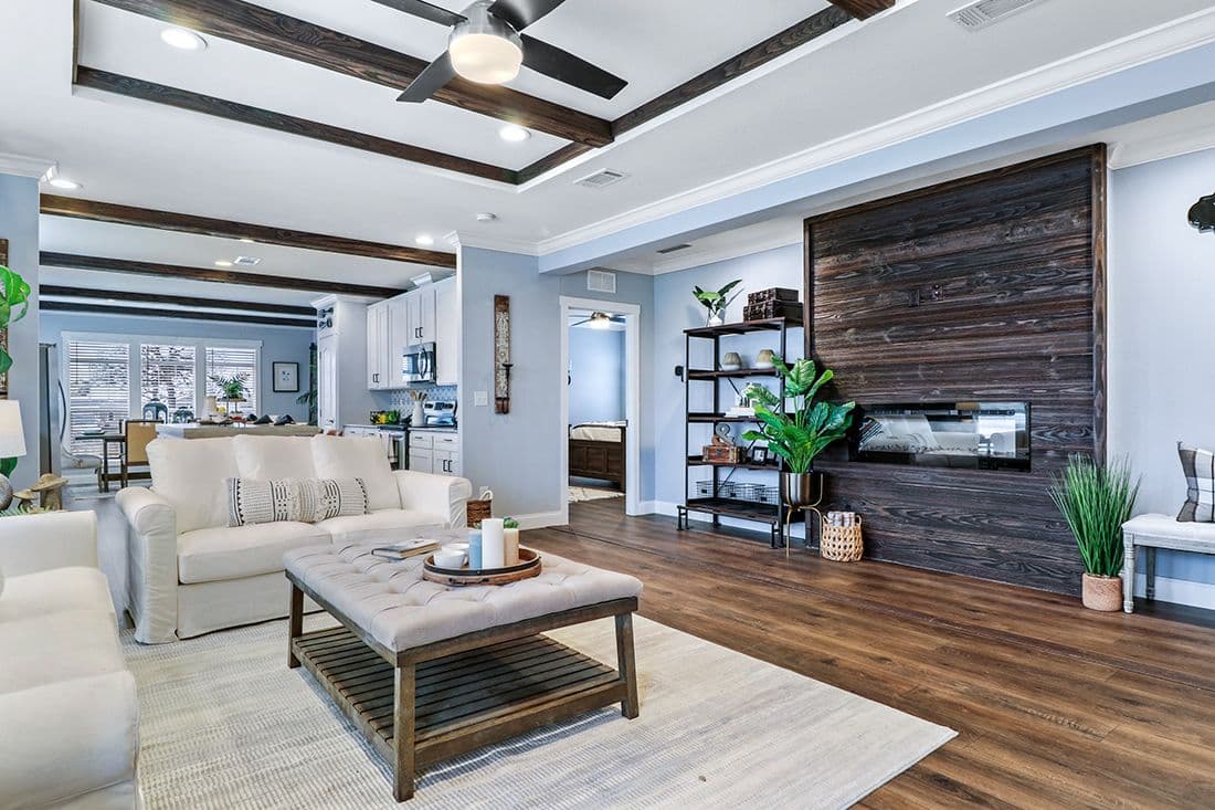 The THE VAIL Living Room. This Manufactured Mobile Home features 3 bedrooms and 2 baths.