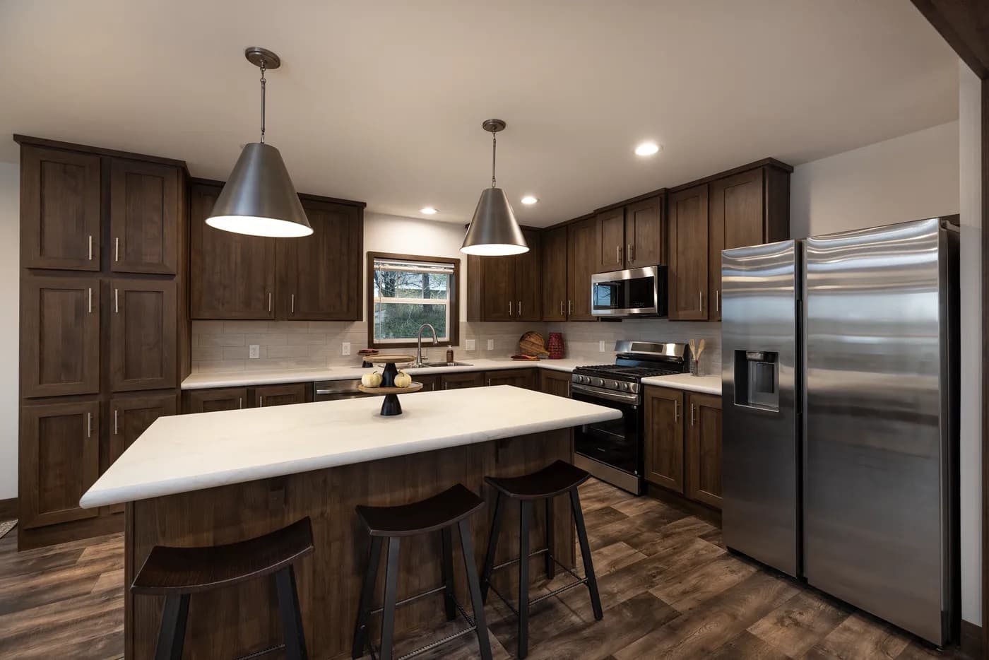 The RAMSEY 75 Kitchen. This Manufactured Mobile Home features 4 bedrooms and 2 baths.