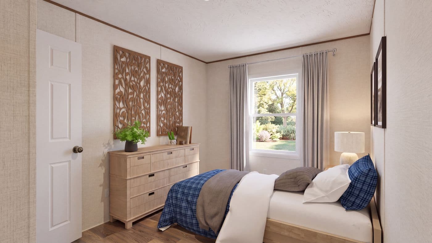 The CEDAR Guest Bedroom. This Manufactured Mobile Home features 3 bedrooms and 2 baths.