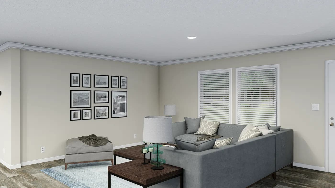 The CAROLINIAN M5010 Living Room. This Manufactured Mobile Home features 3 bedrooms and 2 baths.