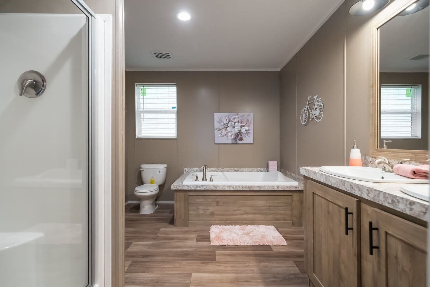 The TRADITION 56D Primary Bathroom. This Manufactured Mobile Home features 3 bedrooms and 2 baths.