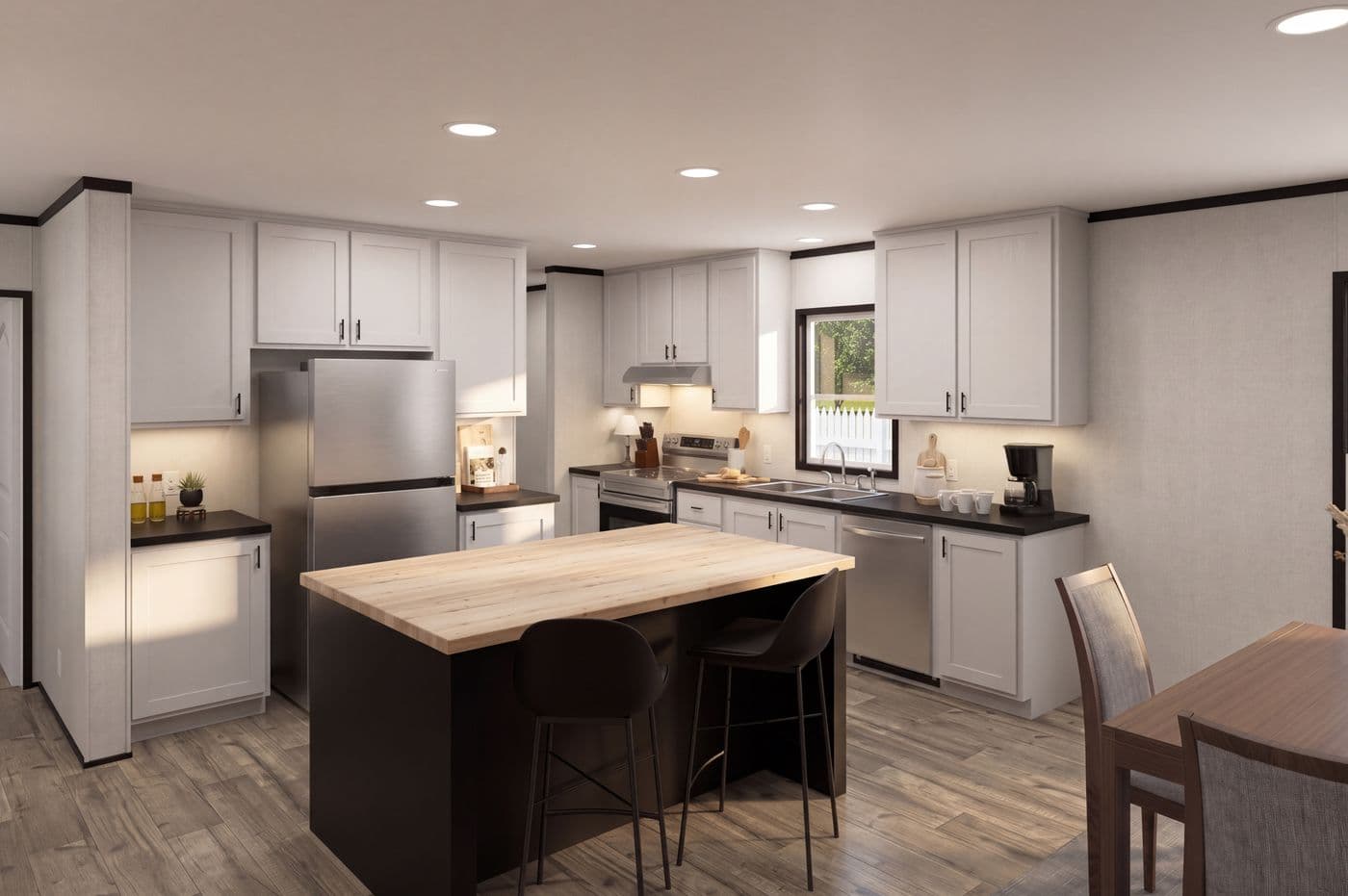 The THE MOUNTAINEER 48 Kitchen. This Manufactured Mobile Home features 3 bedrooms and 2 baths.