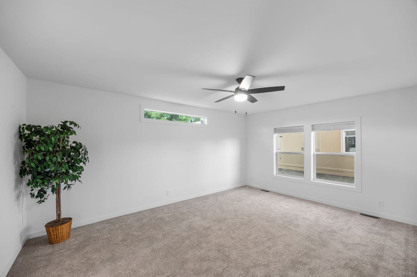 The LULABELLE 4 Primary Bedroom. This Manufactured Mobile Home features 4 bedrooms and 2.5 baths.