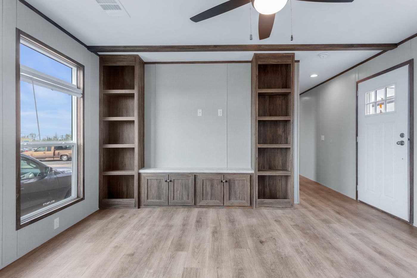 The ANNIVERSARY 16683B Living Room. This Manufactured Mobile Home features 3 bedrooms and 2 baths.