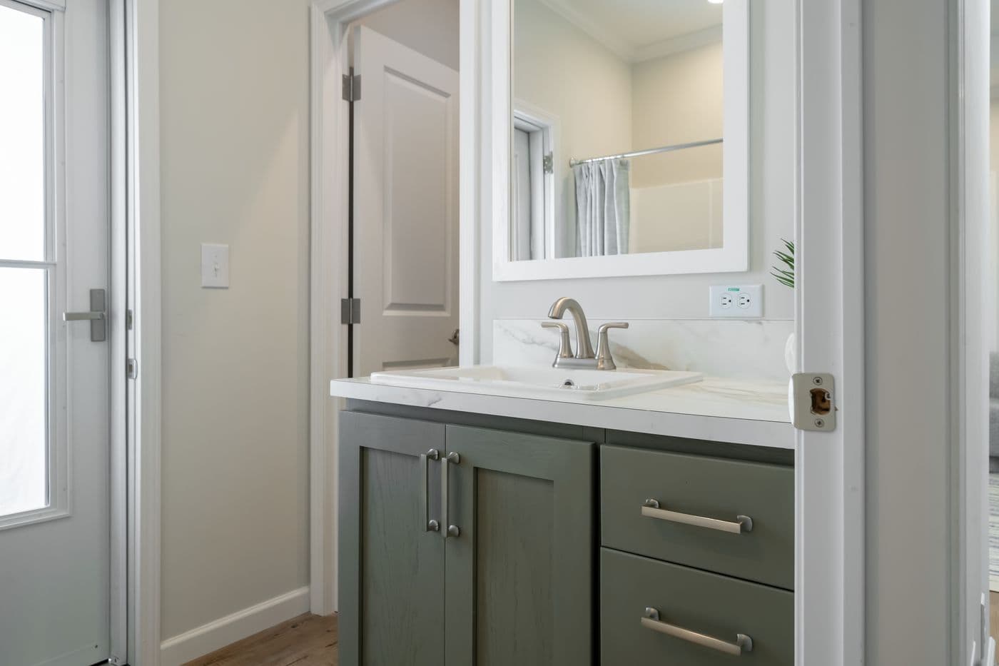 The TIFFANY Guest Bathroom. This Manufactured Mobile Home features 2 bedrooms and 2 baths.