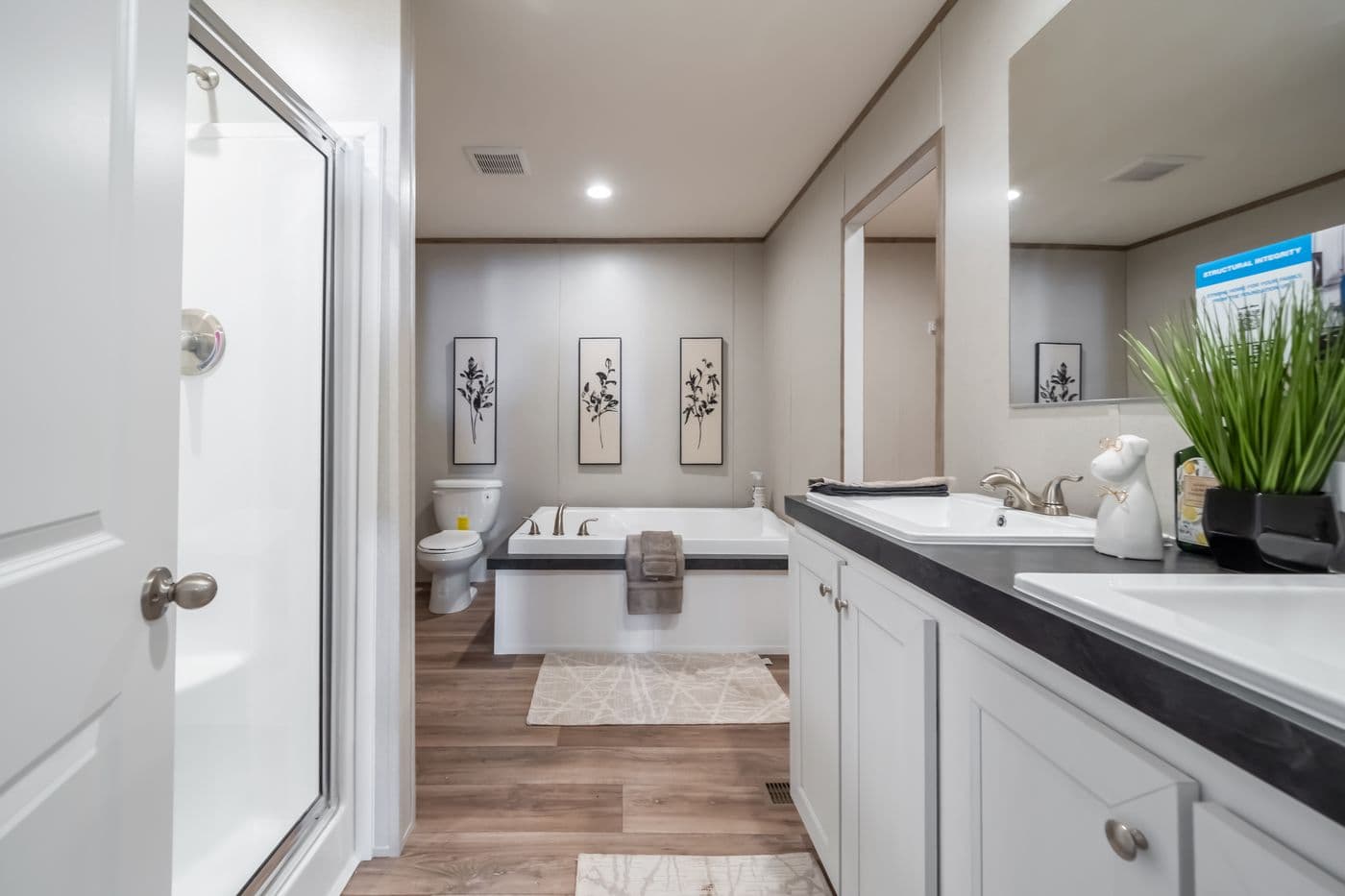 The ECLIPSE Primary Bathroom. This Manufactured Mobile Home features 4 bedrooms and 2 baths.