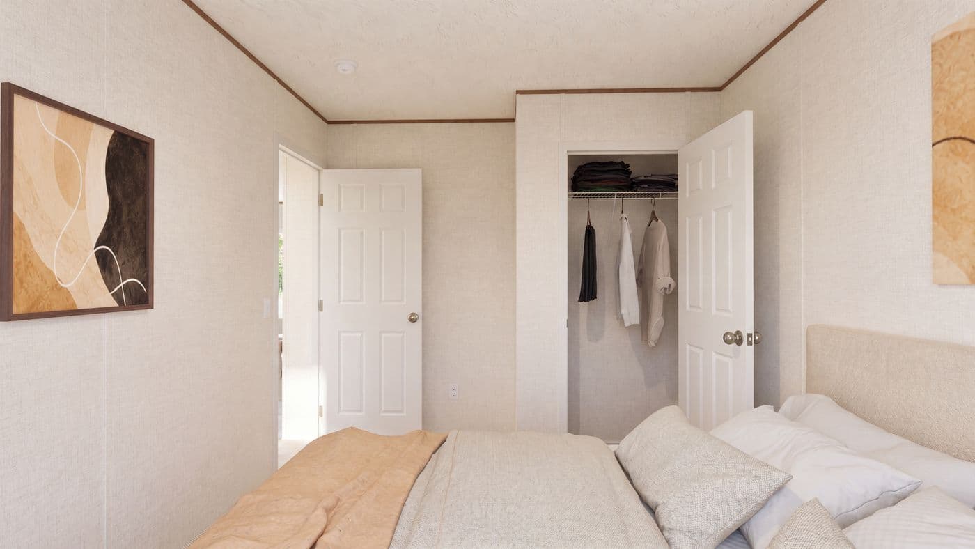 The OAK Bedroom. This Manufactured Mobile Home features 4 bedrooms and 2 baths.