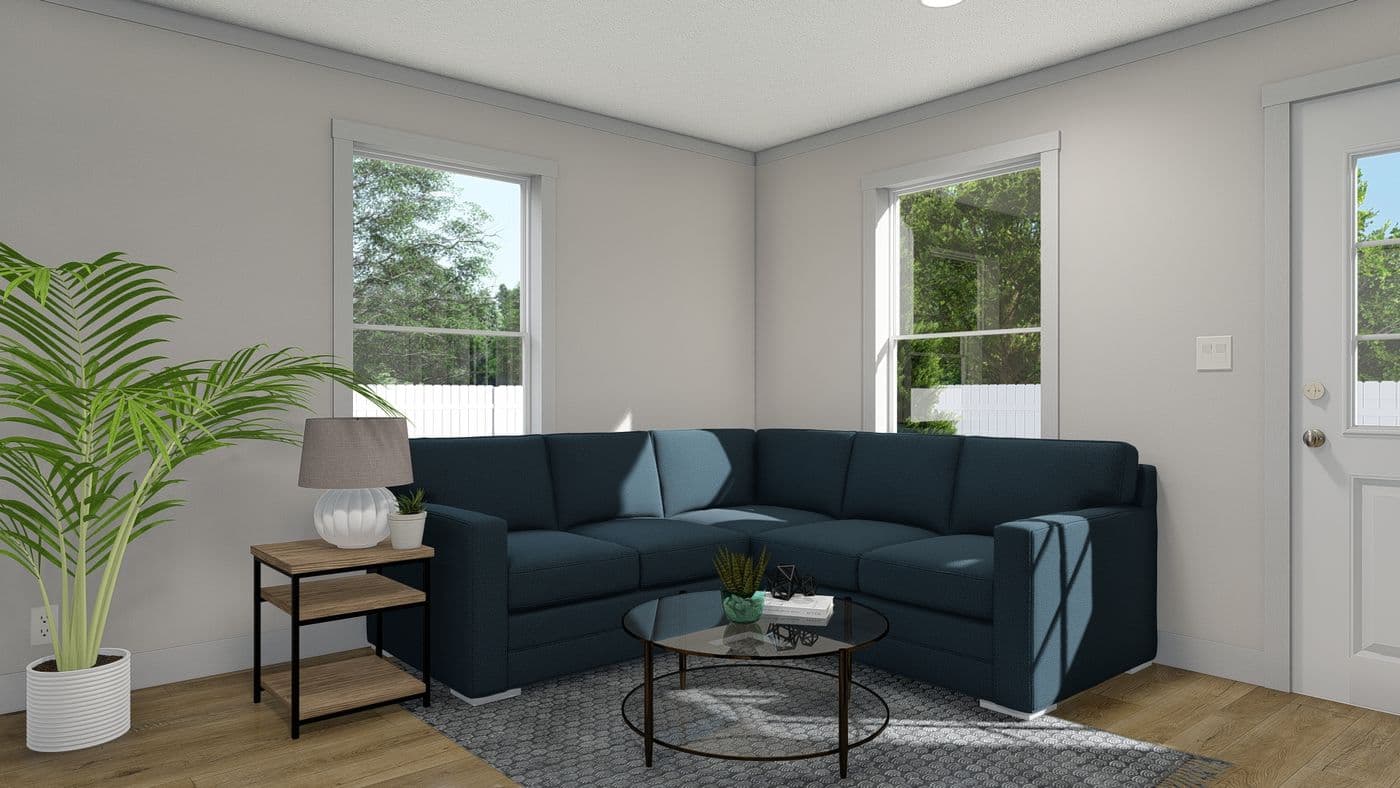 The 2003 "ROCKET MAN" 6628 Living Room. This Manufactured Mobile Home features 3 bedrooms and 2 baths.