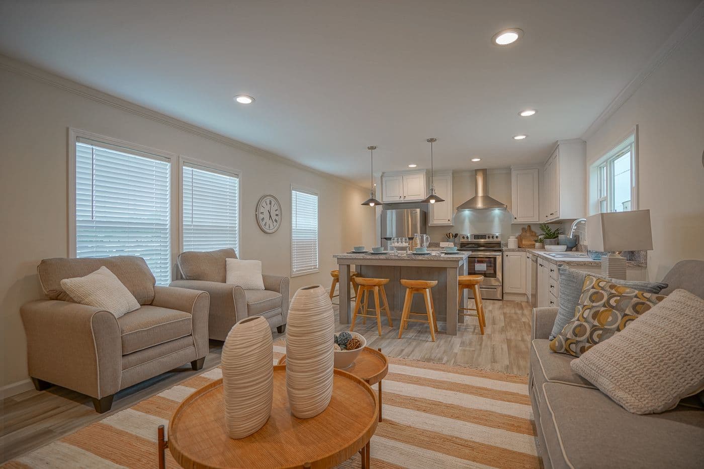 The 777-2 "COOL BREEZE" 7616 Living Room. This Manufactured Mobile Home features 3 bedrooms and 2 baths.