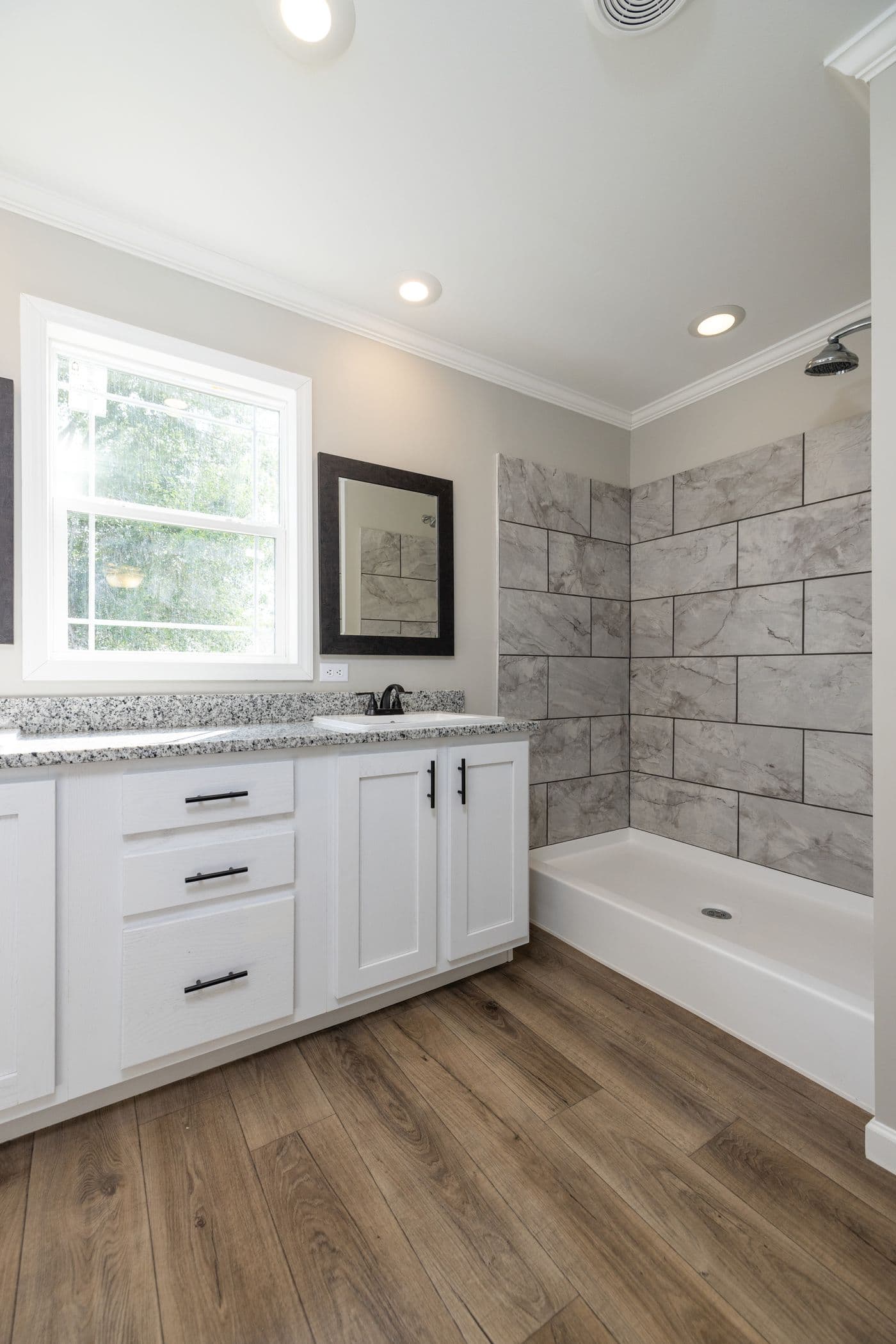 The HAWTHORNE Primary Bathroom. This Manufactured Mobile Home features 3 bedrooms and 2 baths.