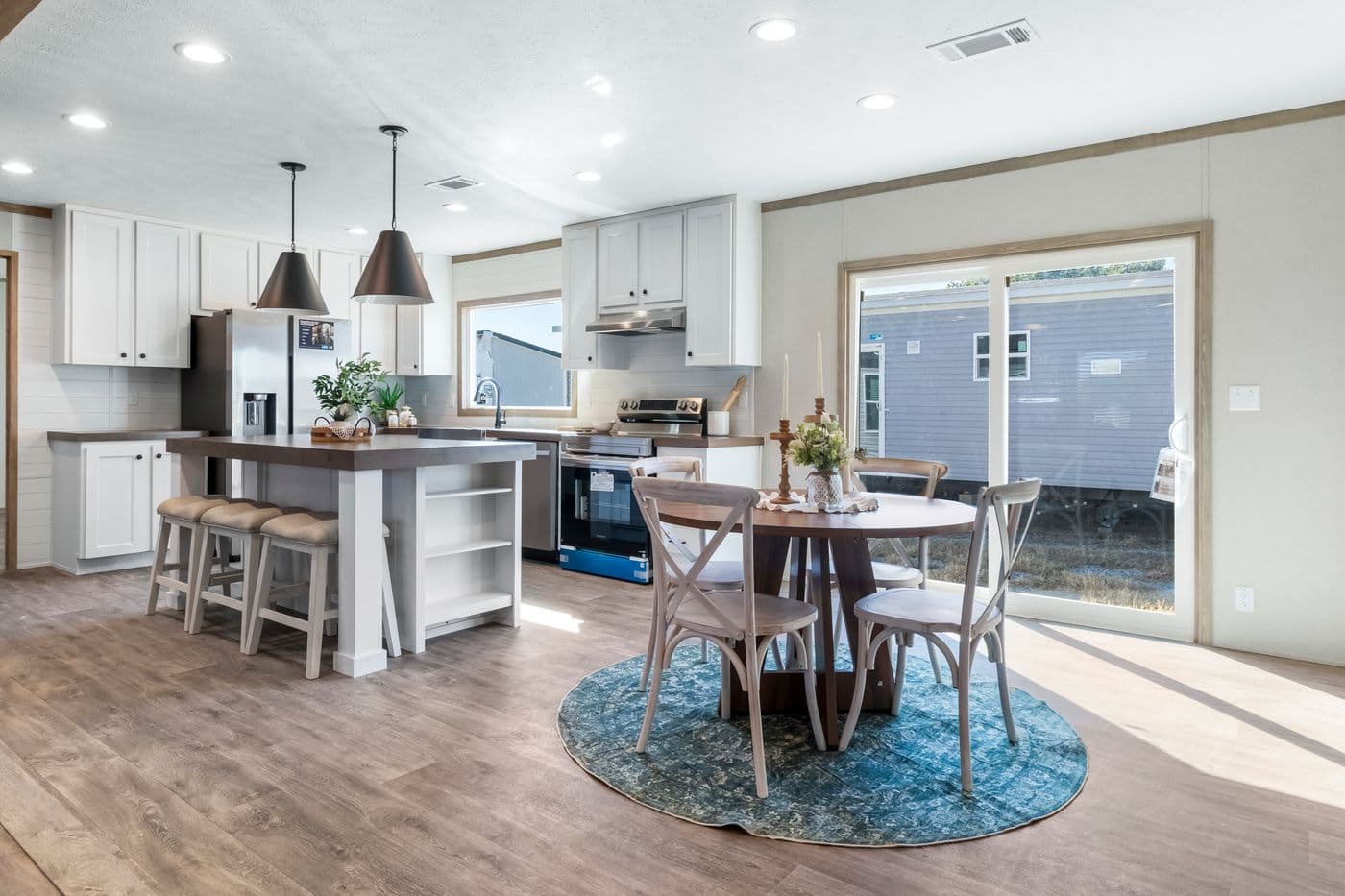 The THE BIG DEAL 52 Kitchen. This Manufactured Mobile Home features 3 bedrooms and 2 baths.