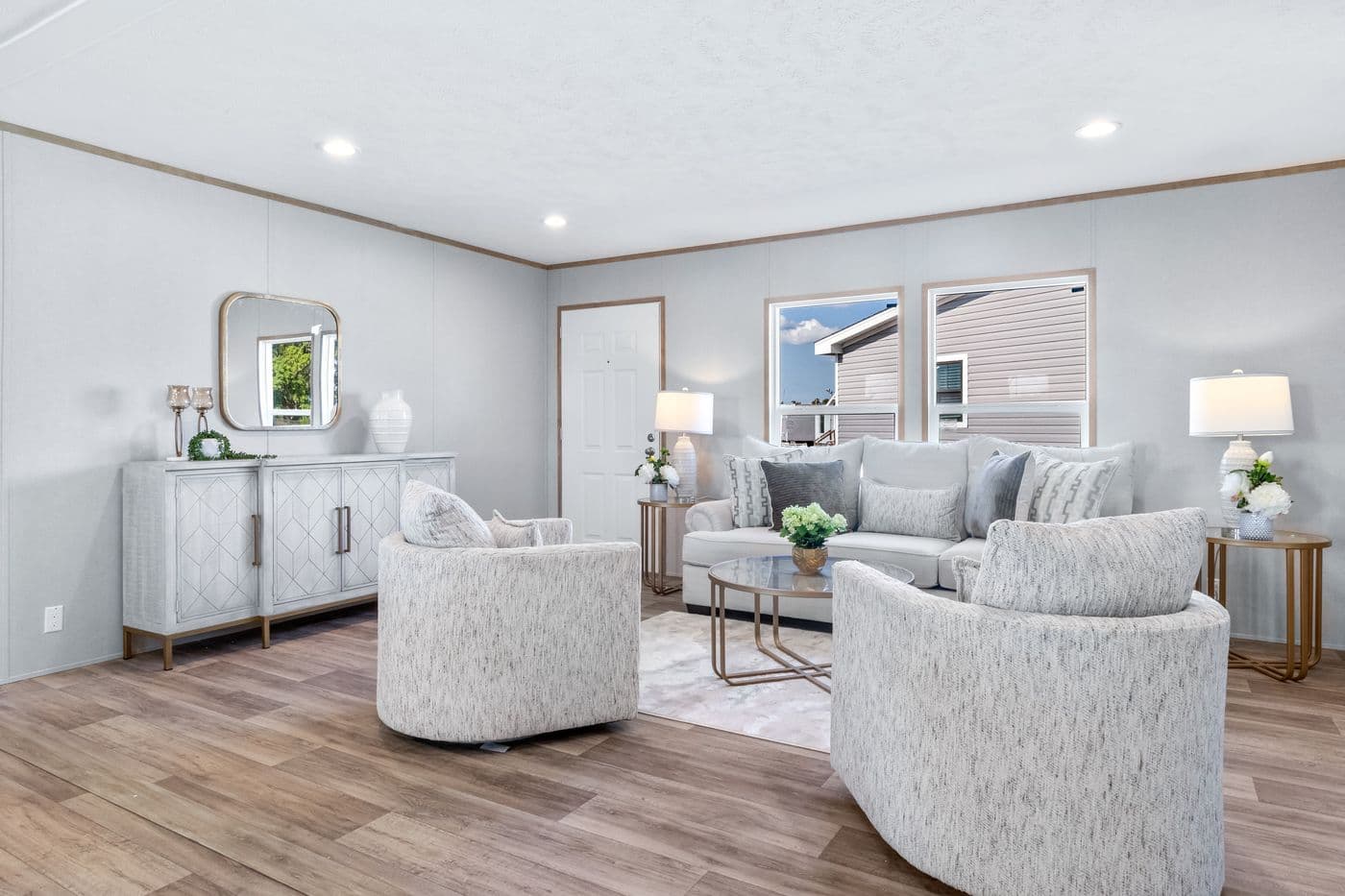 The ASPIRE Living Room. This Manufactured Mobile Home features 3 bedrooms and 2 baths.