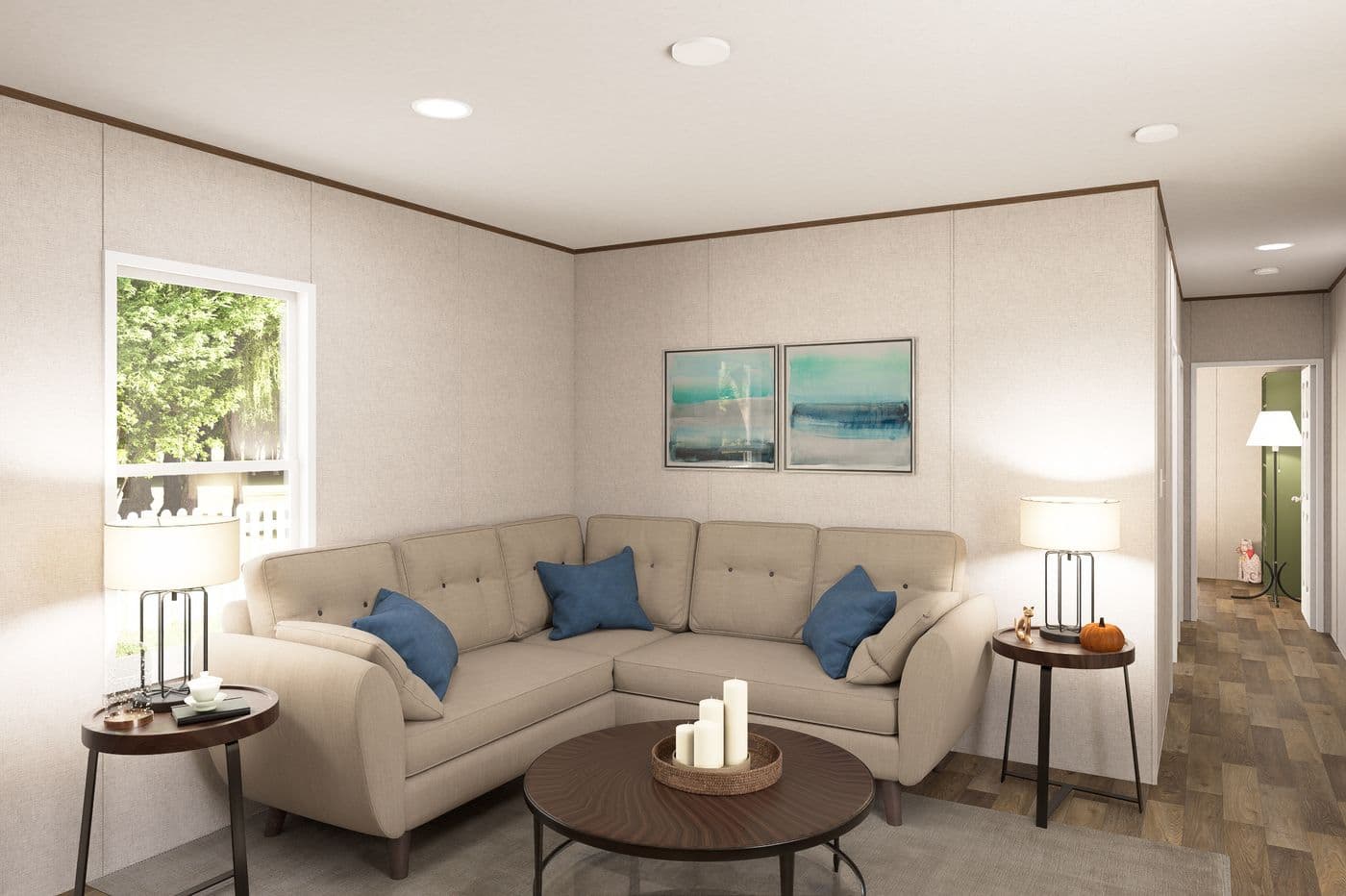 The HICKORY Living Room. This Manufactured Mobile Home features 3 bedrooms and 2 baths.