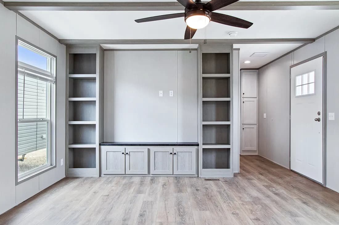 The ANNIVERSARY 16682F Living Room. This Manufactured Mobile Home features 2 bedrooms and 2 baths.