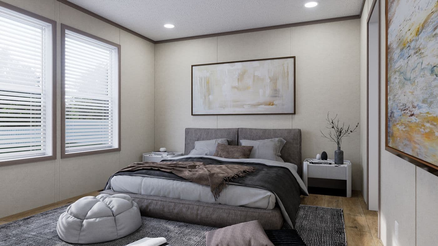 The 5224-CC55 STONEBRIDGE 52 Primary Bedroom. This Manufactured Mobile Home features 3 bedrooms and 2 baths.