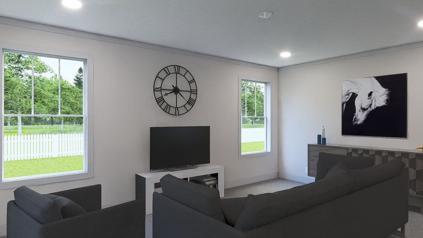 The JOHNNY B GOODE Living Room. This Manufactured Mobile Home features 3 bedrooms and 2 baths.