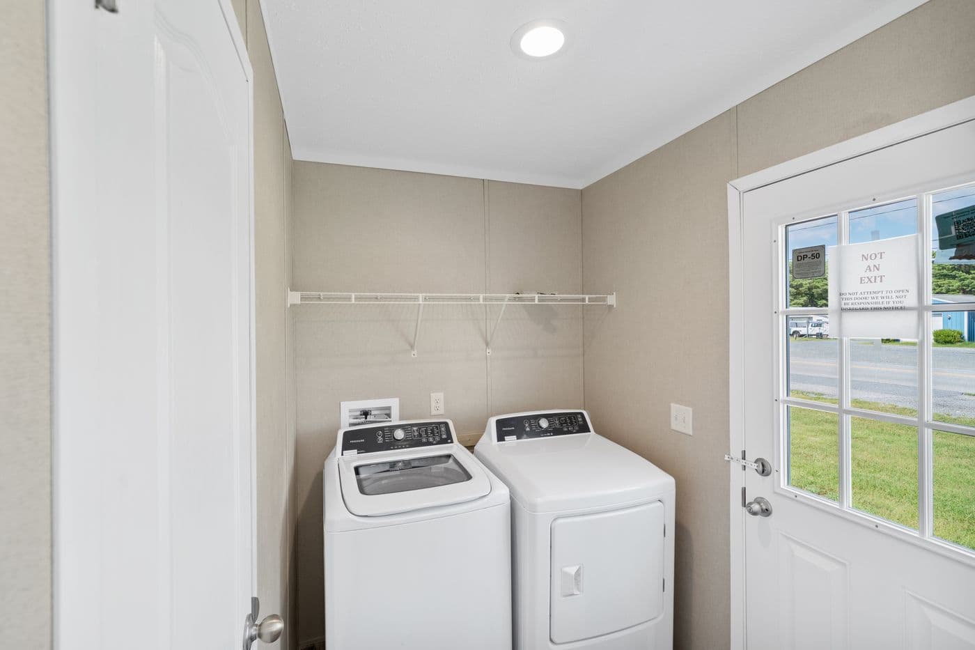 The ZIRCON Utility Room. This Manufactured Mobile Home features 3 bedrooms and 2 baths.