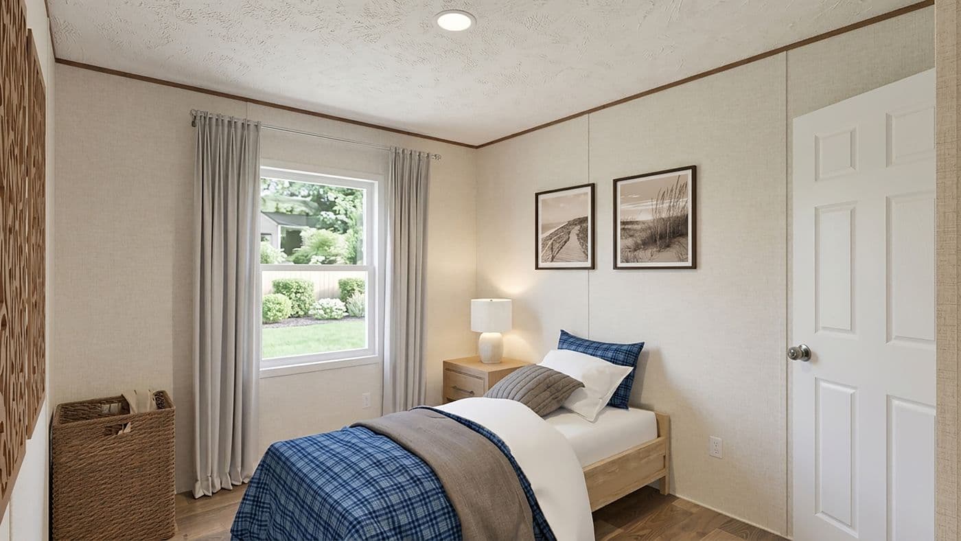 The MAPLE Guest Bedroom. This Manufactured Mobile Home features 3 bedrooms and 2 baths.