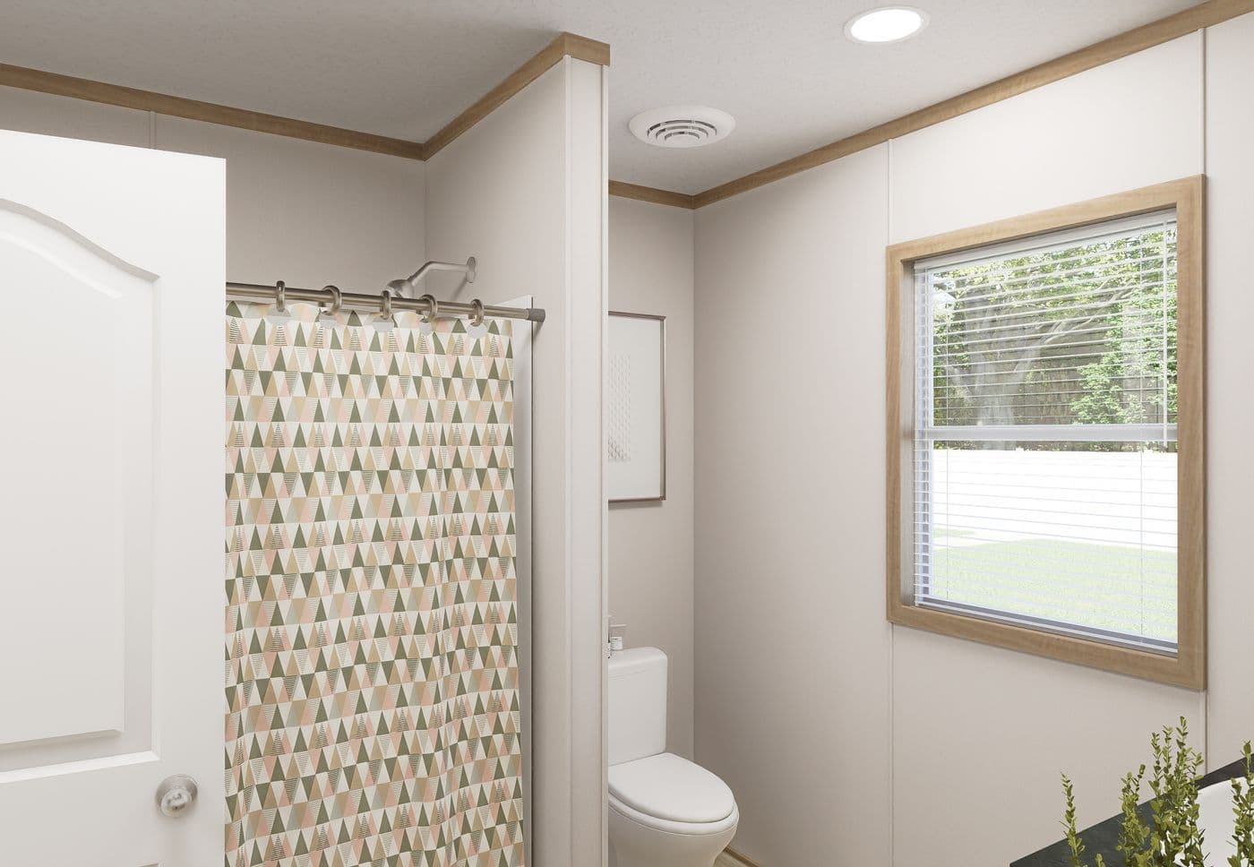 The THE MOUNTAINEER 72 Guest Bathroom. This Manufactured Mobile Home features 3 bedrooms and 2 baths.