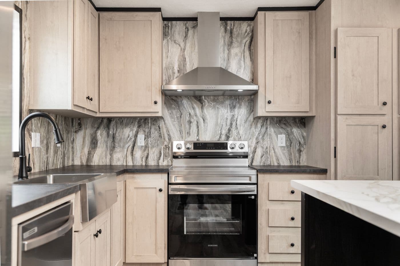 The THE FUJI Kitchen. This Manufactured Mobile Home features 3 bedrooms and 2 baths.