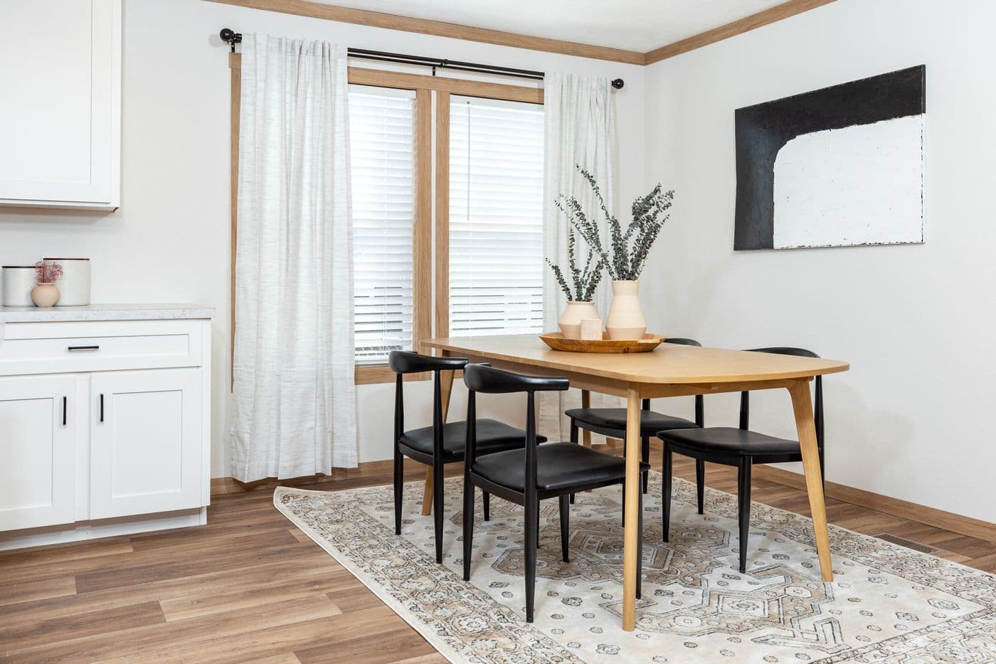 The WILDER Dining Area. This Manufactured Mobile Home features 3 bedrooms and 2 baths.