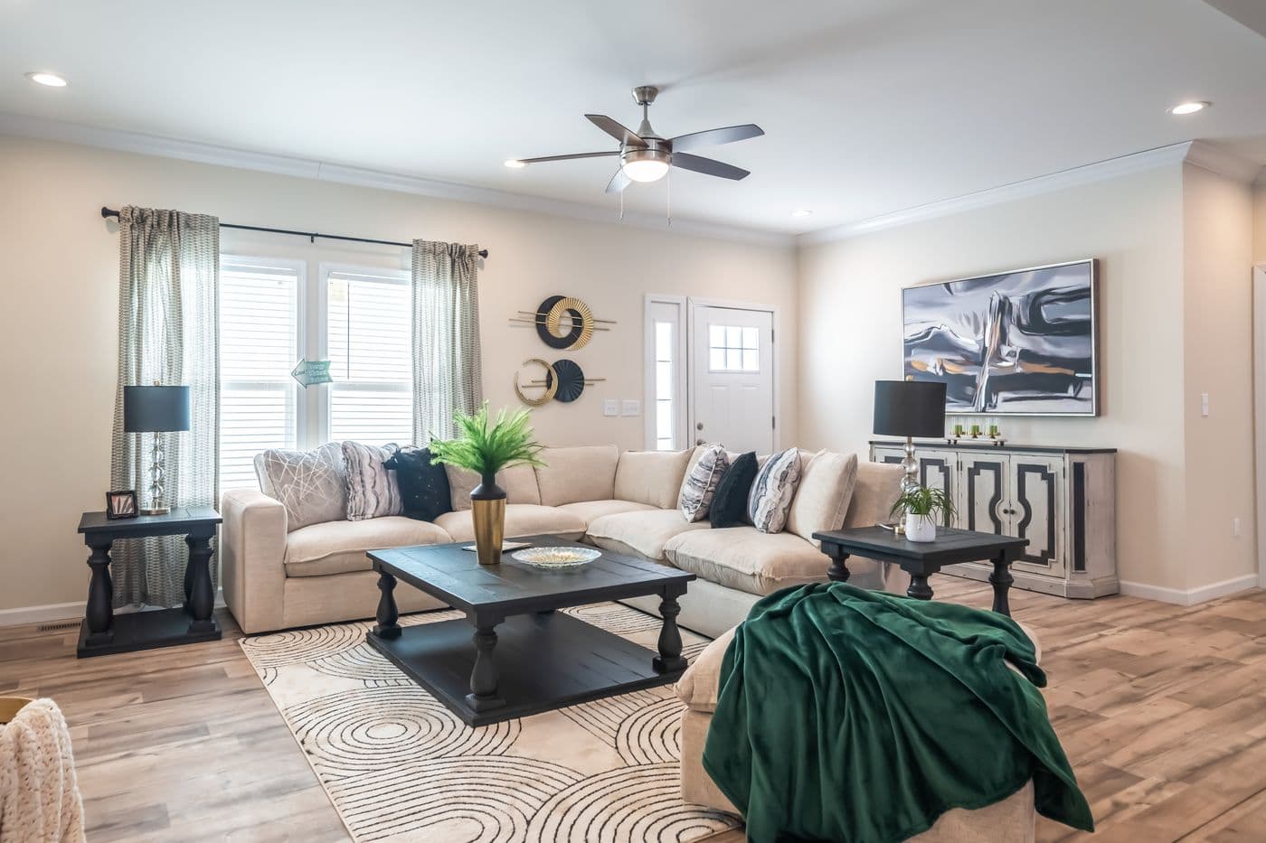 The SUPER 68 ELITE Living Room. This Manufactured Mobile Home features 3 bedrooms and 2 baths.