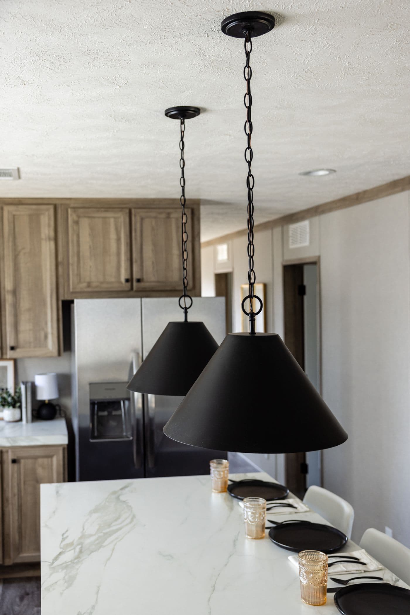 The STERLING ANNIVERSARY Kitchen. This Manufactured Mobile Home features 3 bedrooms and 2 baths.