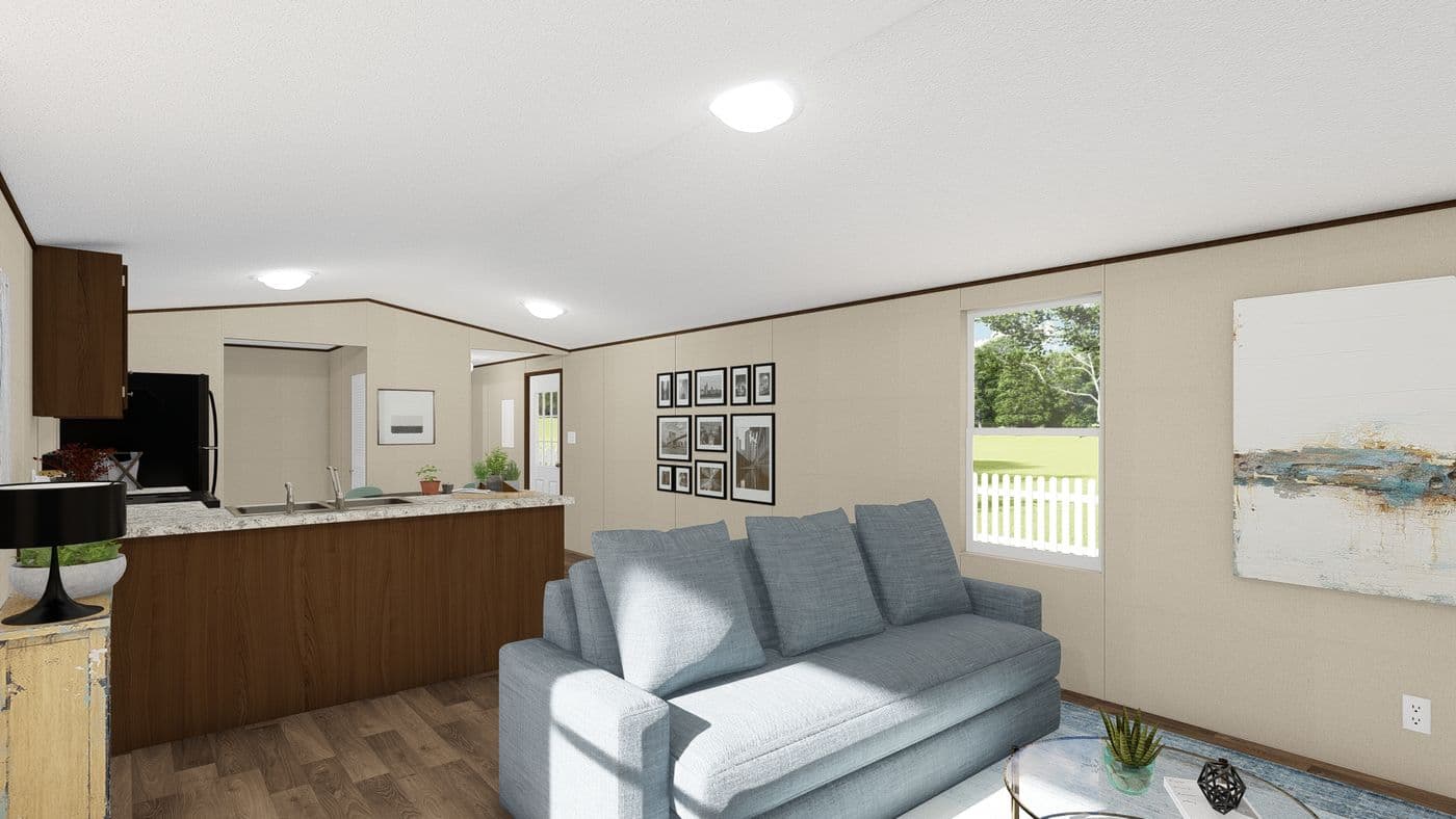 The BLISS Living Room. This Manufactured Mobile Home features 2 bedrooms and 1 bath.