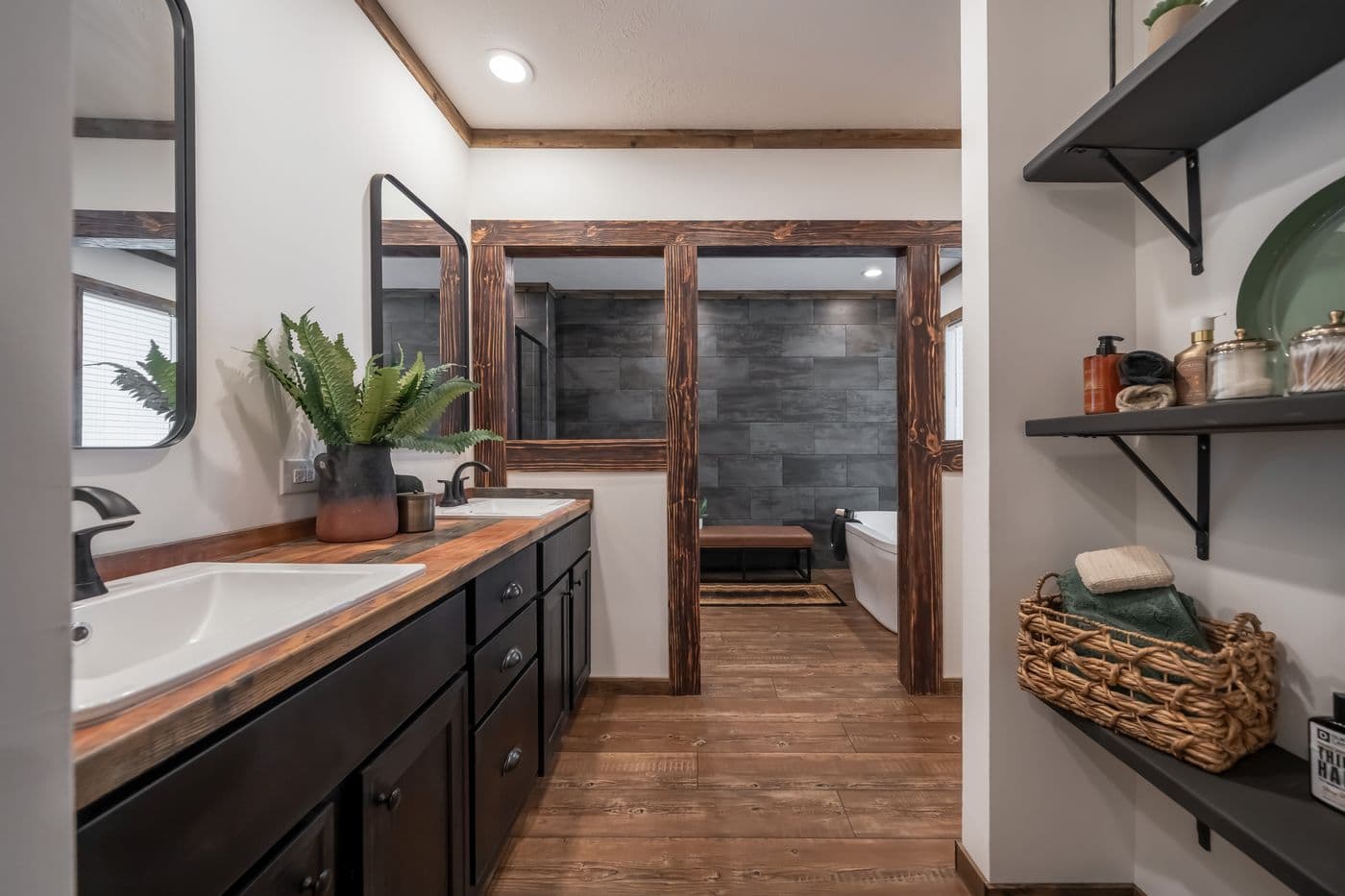 The THE MILL HOUSE Primary Bathroom. This Manufactured Mobile Home features 3 bedrooms and 2 baths.