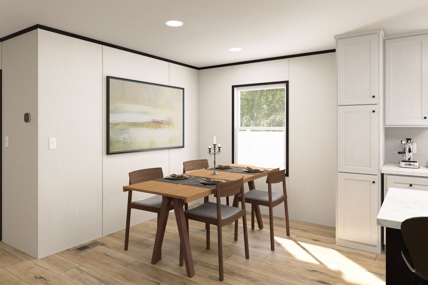 The ULTRA FLEX Dining Area. This Manufactured Mobile Home features 3 bedrooms and 2 baths.