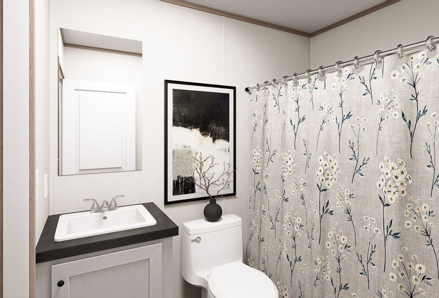 The OASIS Guest Bathroom. This Manufactured Mobile Home features 3 bedrooms and 2 baths.