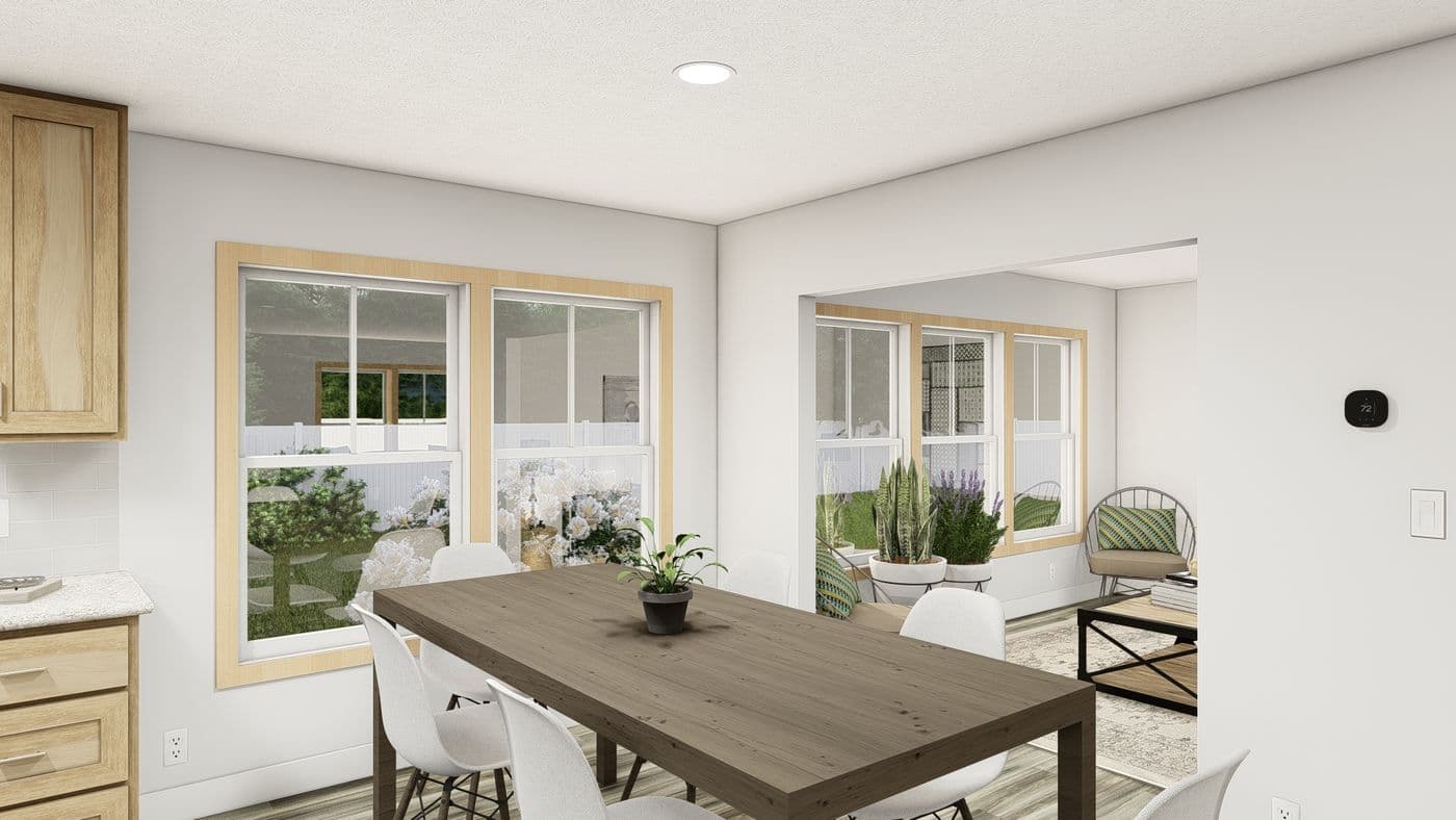 The LEGACY 377 Dining Room. This Manufactured Mobile Home features 3 bedrooms and 2 baths.