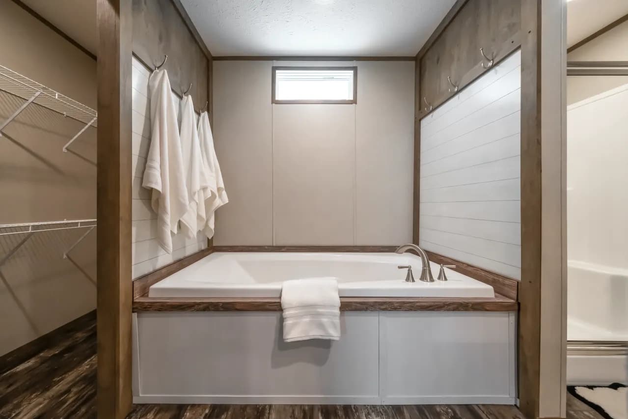 The ANNIVERSARY ENTERTAINER Exterior. This Manufactured Mobile Home features 3 bedrooms and 2 baths.