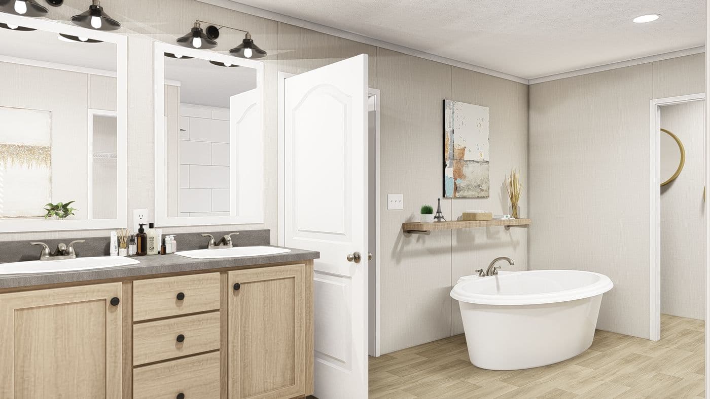 The THE RESERVE 76 Primary Bathroom. This Manufactured Mobile Home features 4 bedrooms and 2 baths.