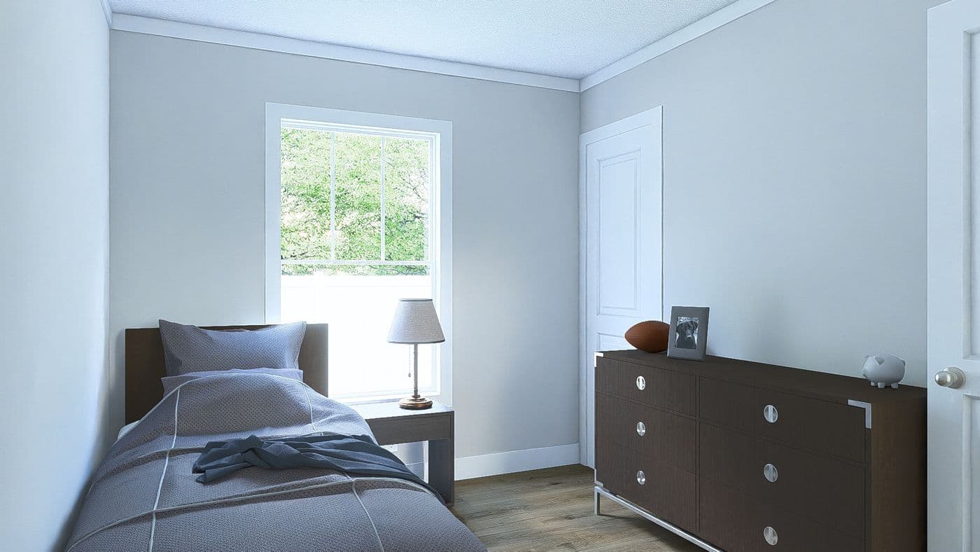 The RHYTHM NATION Guest Bedroom. This Manufactured Mobile Home features 3 bedrooms and 2 baths.