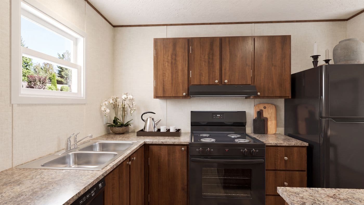 The BIRCH Kitchen. This Manufactured Mobile Home features 3 bedrooms and 2 baths.