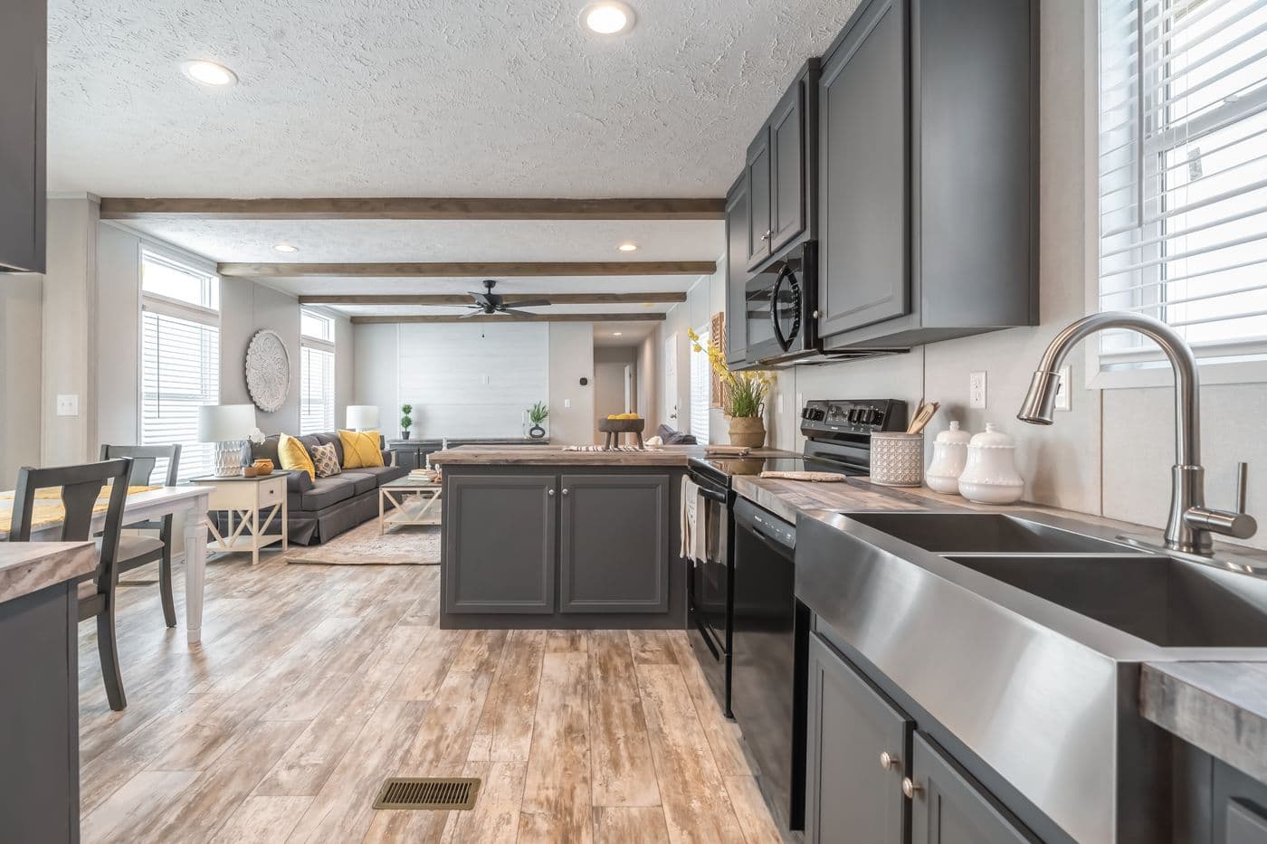 The ANNIVERSARY CHOICE Kitchen. This Manufactured Mobile Home features 3 bedrooms and 2 baths.