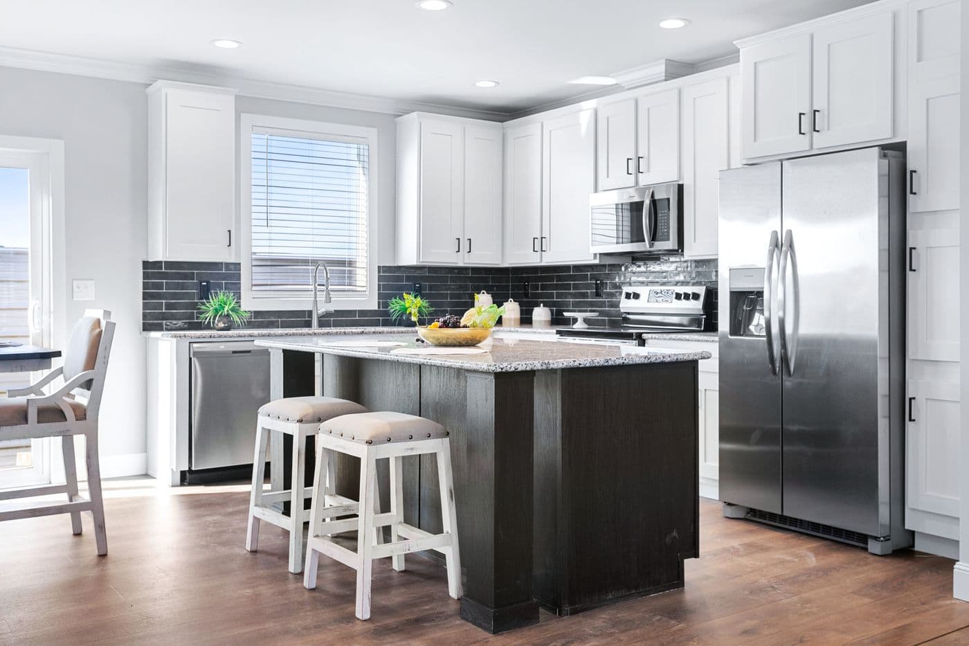 The THE FUJI Kitchen. This Manufactured Mobile Home features 4 bedrooms and 3 baths.