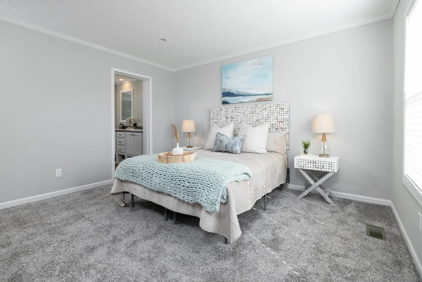 The THE JEFFERSON Primary Bedroom. This Manufactured Mobile Home features 3 bedrooms and 2 baths.