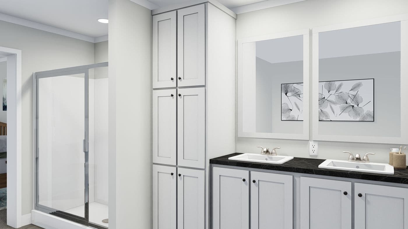 The THE BREEZE Primary Bathroom. This Manufactured Mobile Home features 3 bedrooms and 2 baths.
